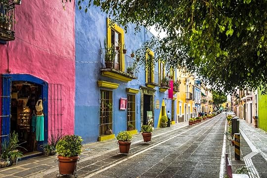 Colorful buildings lining a street in Puebla, Mexico