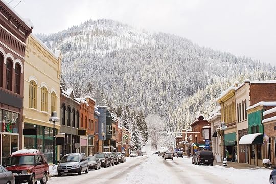 Wallace Idaho with snow and mountain in background