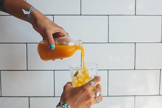 Jamu healthy asian drink with turmeric, orange juice