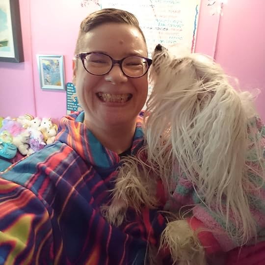 My lovely artist neighbour Jeanette just surprised me by giving me her rainbowy psychedelic jacket! Every time I saw her in it I mentioned how beautiful it was. I love rainbows both for standing for the LGBTQIA community and for hope and magic and beauty, and she knows that. And as a fellow creative soul she loves colour, too. I’m delighted! Colour makes me happier – and the kindness and generosity of neighbours and friends always does.<br /><br />And though I still find many things about Christmas hard, yesterday I wrote a ton of Christmas cards with meaningful notes and Petal and I delivered them to a bunch of neighbors in my building. I think it helps to know that someone is thinking about you, especially when it’s a hard time of year or if you’re alone. And many of my neighbours have been dropping off cards for weeks, which reminded me to.<br /><br />What nice thing has happened to you lately or have you done for others?<br /><br />#kindnessmatters #rainbows<br />#cherylrainfield #YAwriter #LGBTQwriter #booknerd #bookworm #ireadYA #survivor #feminist