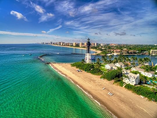 Fort Lauderdale lighthouse and emerald water on the coast