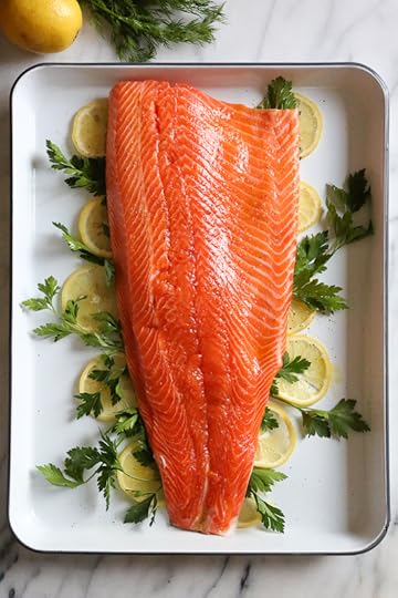 This simple, healthy Baked Salmon dish is made with fresh lemon, and lots of fresh herbs such as dill, parsley, chives.