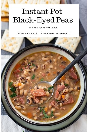 Bowl of Instant Pot Black Eyes Peas recipe on a black and white cloth napkin served in a grey bowl with a black border.