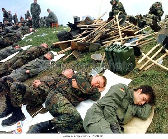 sb hohenwutzen archive after hours of continuous operation exhausted armed forces soldiers relax at the dike polenmarkt hohenwutzen sb tankstelle
