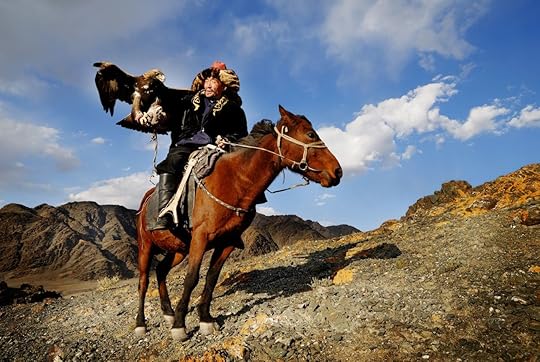 Kazakh men traditionally hunt foxes and wolves using trained golden eagles in Mongolia