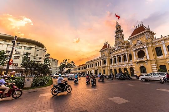 Traffic in front of Ho Chi Minh City Hall at twilight