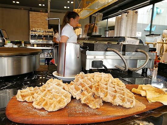 People making Belgian waffles in Brussels, Belgium
