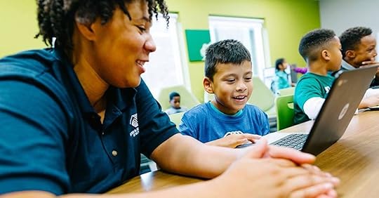 Volunteer teacher with a student from the Boys and Girls Club of America