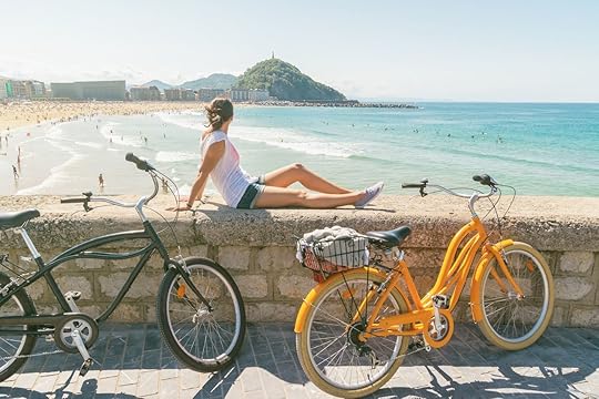 Young woman enjoying the view in San Sebastian at summer, Spain