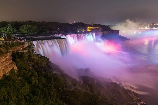 Niagara Falls illuminated pink at night