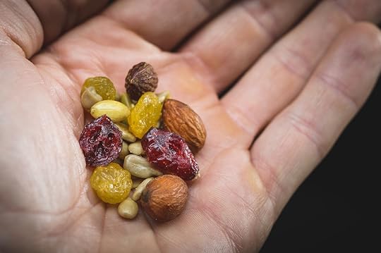 A person sharing some healthy trail mix