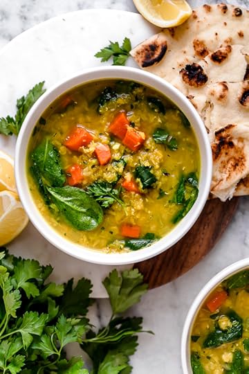 This delicious, Middle Eastern inspired Lentil Soup, made with red lentils, turmeric, spinach, carrots and lemon will exceed your expectations. It's golden in color, and very easy to make and leftovers are freezer-friendly.