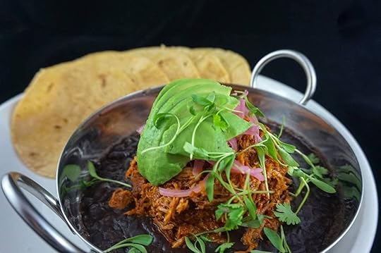 La Mulita tortillas with black beans, pulled meat, and avocado