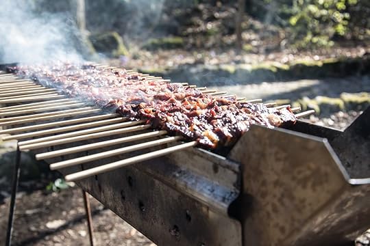 Arrosticini on the grill while turning