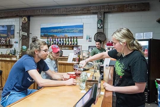 Friends drinking wine together on the Canandaigua Lake Wine Trail