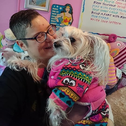 Petal and I were going to go on the Women’s March today but I think it’s just too cold, especially for standing around listening to speeches and then marching. They’re calling for a snowstorm and -19 weather, and when I took Petal out I felt the cold through my jeans even though I’m wearing long underwear underneath (and so is Petal) . Also Petal has a urinary tract infection which were treating but we’ve both beem up a lot of the night, second night in a row.<br /><br />I am sorry to miss it but I am there in spirit. My sign was going to say: “As a lesbian feminist survivor of incest, rape, and torture I march for an end to violence against women and children, especially, and equality (and compassion) for all.<br /><br />#cherylrainfield #YAwriter #LGBTQwriter #booknerd #bookworm #ireadYA #survivor #feminist<br />#petalrainfield #chinesecrested #hairyhairless #dogstagram #ilovemydog #ilovemychinesecresteddog #dogmom