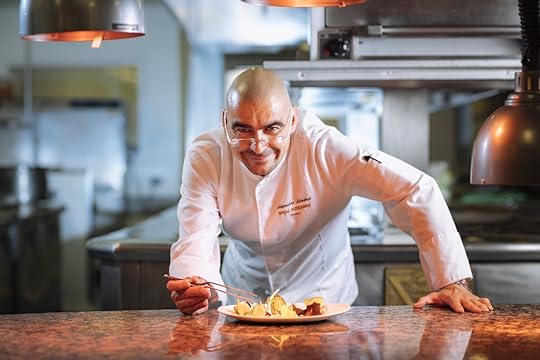 Chef Alejandro Sanchez perfecting a dish at a Barcelo resort