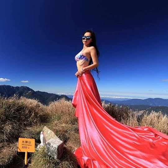 Gigi Wu in a bikini top in the mountains