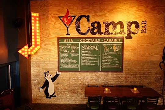 Camp Bar drinks list chalk board on a brick wall