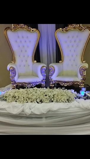 Thorn chairs with gold/silver accents.king and Queen wedding celebration.