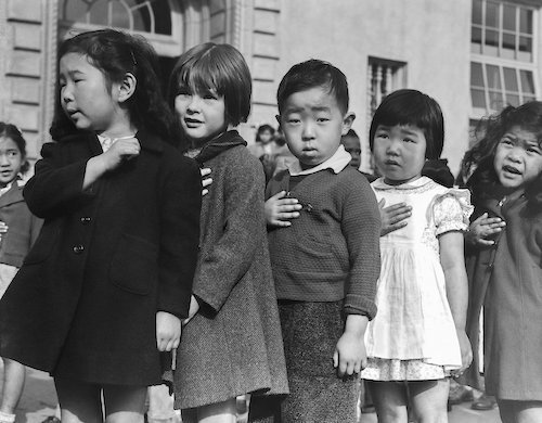 Japanese children pledging allegience at an internment camp - photo by Dorothea Lange, 1942