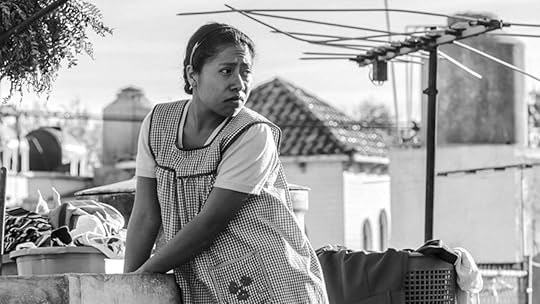 Roma still frame of a woman doing laundry