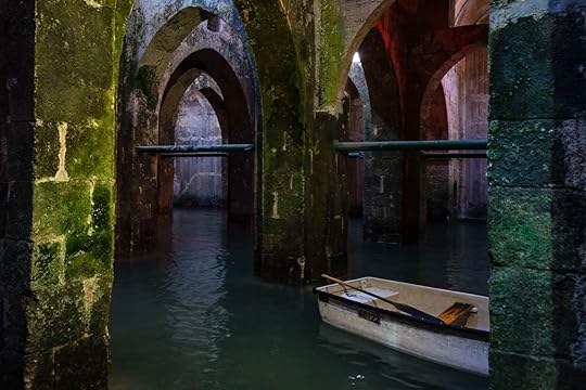 Exploring the 1,200 year old cisterns of Ramla in a row boat