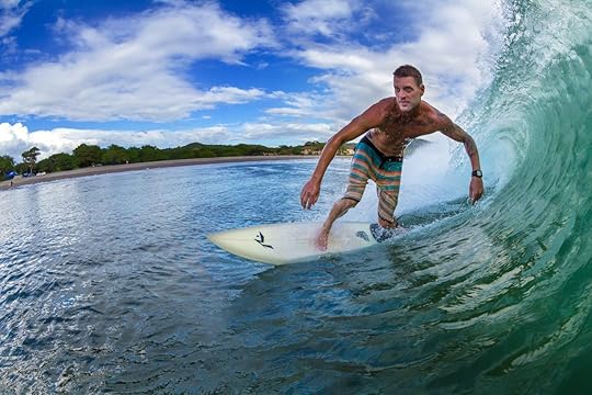 A foreigner surfing enjoying a perfect wave in Playa Santana, in southern Nicaragua beach in Central America