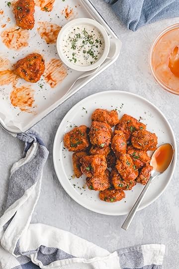 Healthier Baked Buffalo Chicken Nuggets for 418 calories or 6 WW points! This easy recipe is lighter comfort food, with crispy breading, spicy sauce, and cool, creamy blue cheese dressing
