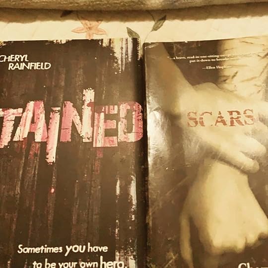 It always feels so good to hear from readers that they love my books and want more! (beaming) Thank you Cristina; I so appreciate it!<br /><br />From Cristina Elizondo: “Cheryl Rainfield. A wonderful friend and a great writer. I have these two books and they are awesome. It’s hard to get the book called SCARS but I moved mountains and the sea and whatever else I had to move to get the book and I got it !!!!! I’m so happy. From a scale 1 to 10, I recommend her books 125 !!! Keep writing girl and once you do, I’ll but that book too. You’re awesome !!!!!” #cherylrainfield #scars #STAINED #selfharm #sexualabuse #trauma #healing #YAlitmentalhealth #YAsaves #YAwriter #LGBTQwriter #booknerd #bookworm #ireadYA #survivor #feminist #YAlit #YAbooks #bookstagram #bookrecs #bookrecommendations
