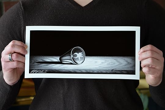 Valentine's Aren Print , Detail of Christopher Paolini holding his print of Aren.