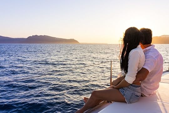 Romantic couple on yacht at sunset
