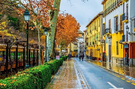 View of a street with bars and restaurants situated on riverside of river darro in spanish city granada