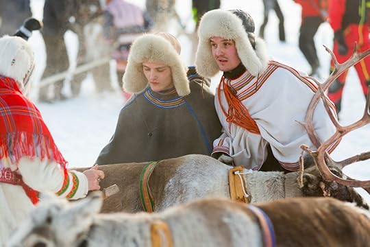 Jokkmokk Winter Market in Lapland with reindeer and indigenous dress