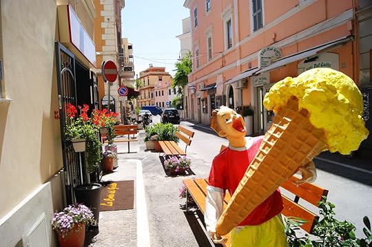 promotional decoration of an ice-cream parlor in a street in the center of the seaside town