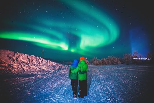 Couple underneath the northern lights