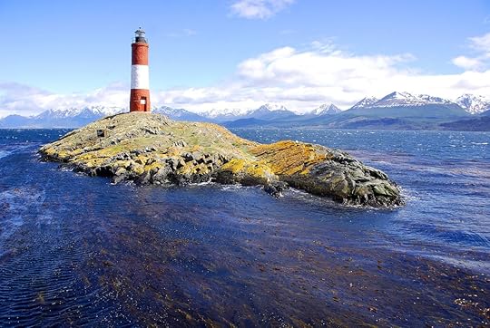 Red and white lighthouse in blue sky in Beagle Channel Ushuaia Patagonia Argentina