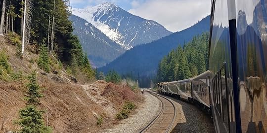 Snowy Peaks from Rocky Mountaineer Train by Lisa Niver
