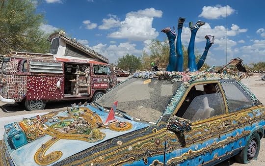 Decorated car and van in the desert in Slab City
