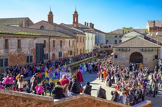 A crowd of people in the carnival party on the canals of the country