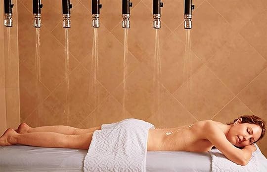 Woman on a massage table getting hydrotherapy