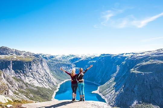 Two people on Trolltunga hiking route in Norway