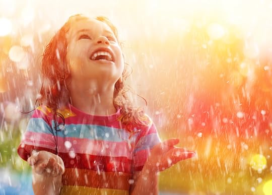 child enjoying moment of grace in rain