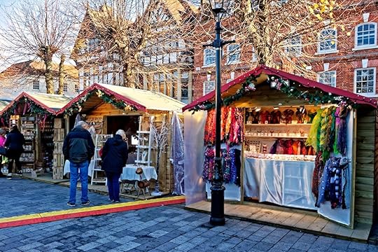 Shoppers at the Christmas Market in Salisbury, UK