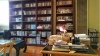 Messy bookcases and table