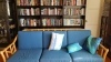 Blue sofa and neat bookcases