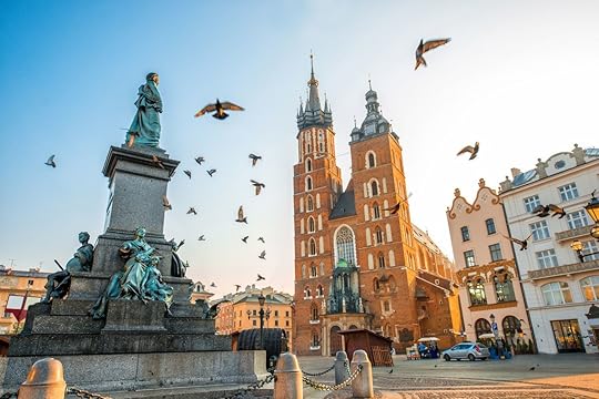 Old city center view with Adam Mickiewicz monument