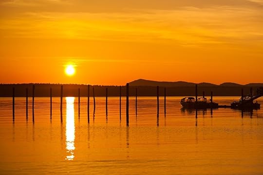 Golden orange sunset in Anacortes, WA Ship Harbor on Fidalgo Island