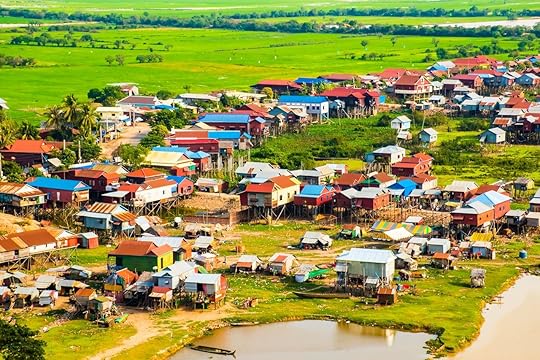 Floating Phnom Krom village, green rice fields in Tonle Sap, Siem Reap, Cambodia