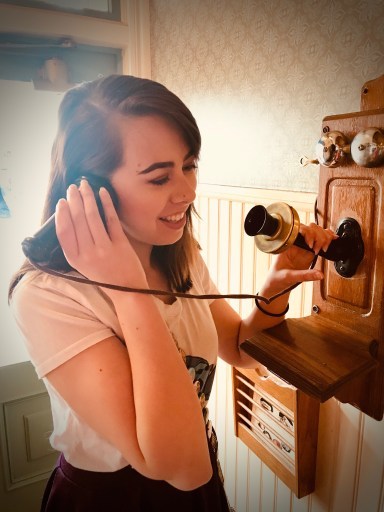 Girl on old fashioned phone